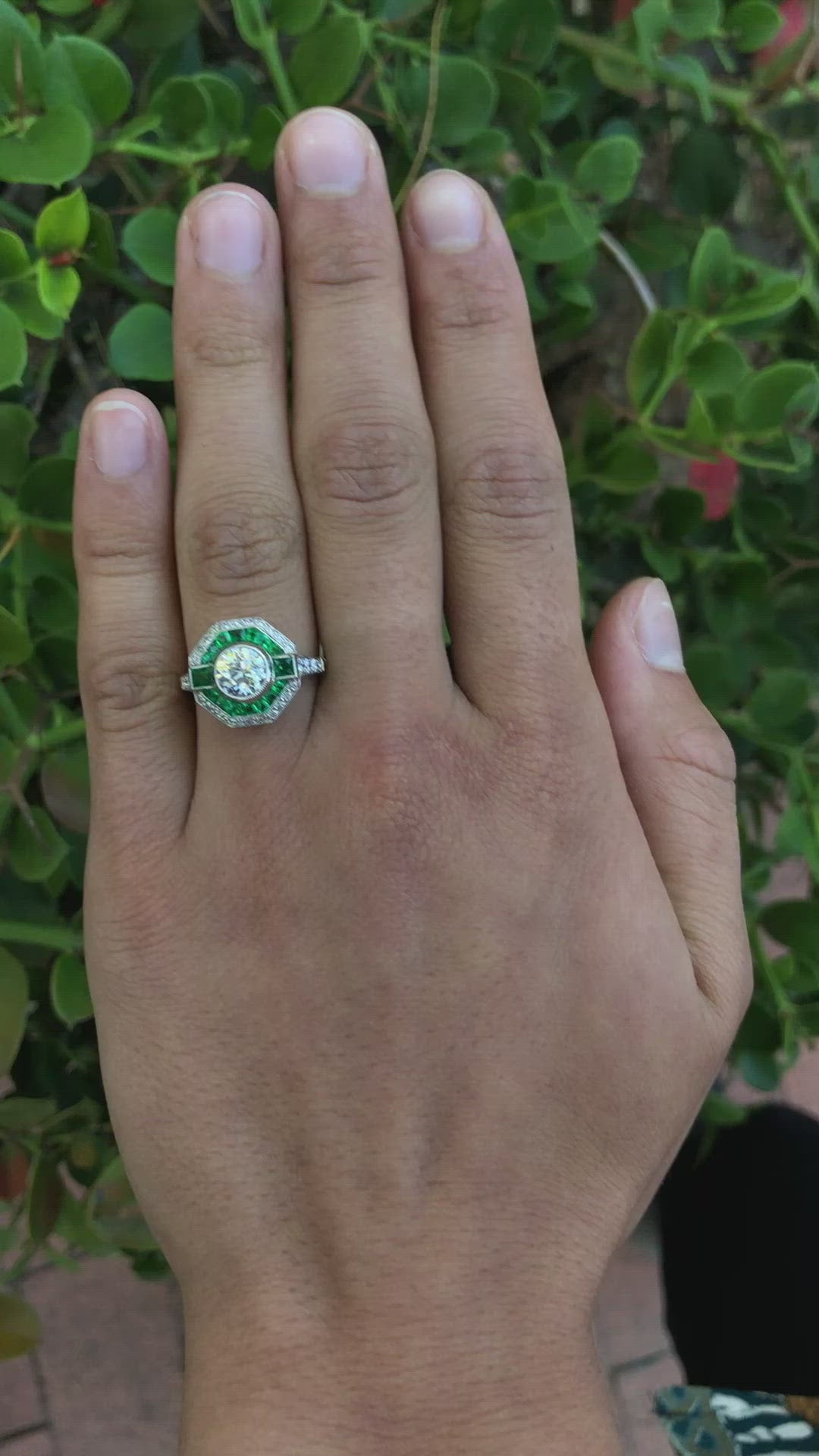 An unique Art deco octagon diamond emerald halo wedding ring.