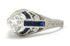 Unique blue sapphire stripes and diamonds Art Deco wedding ring.