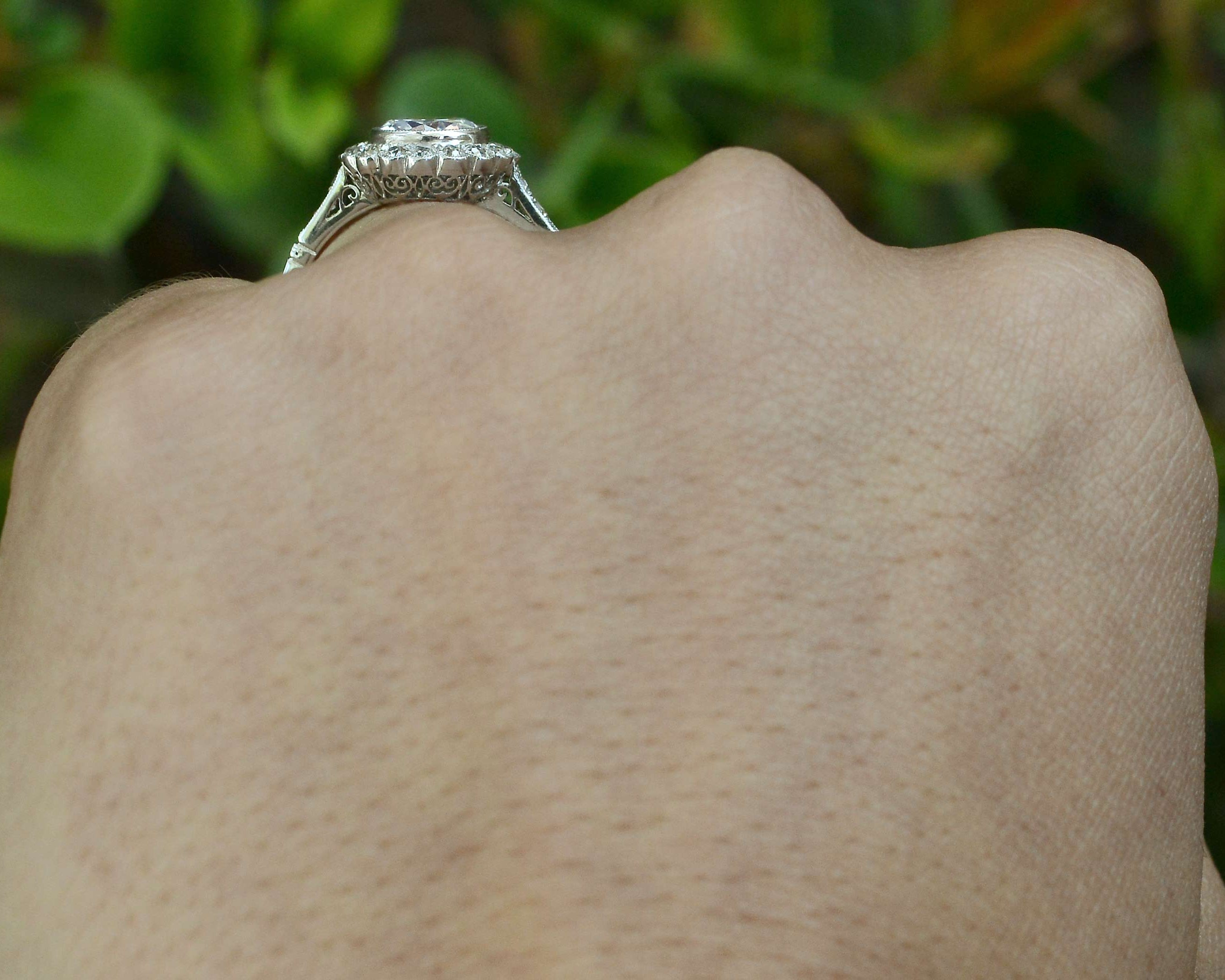 A diamond bezel set Edwardian wedding ring.