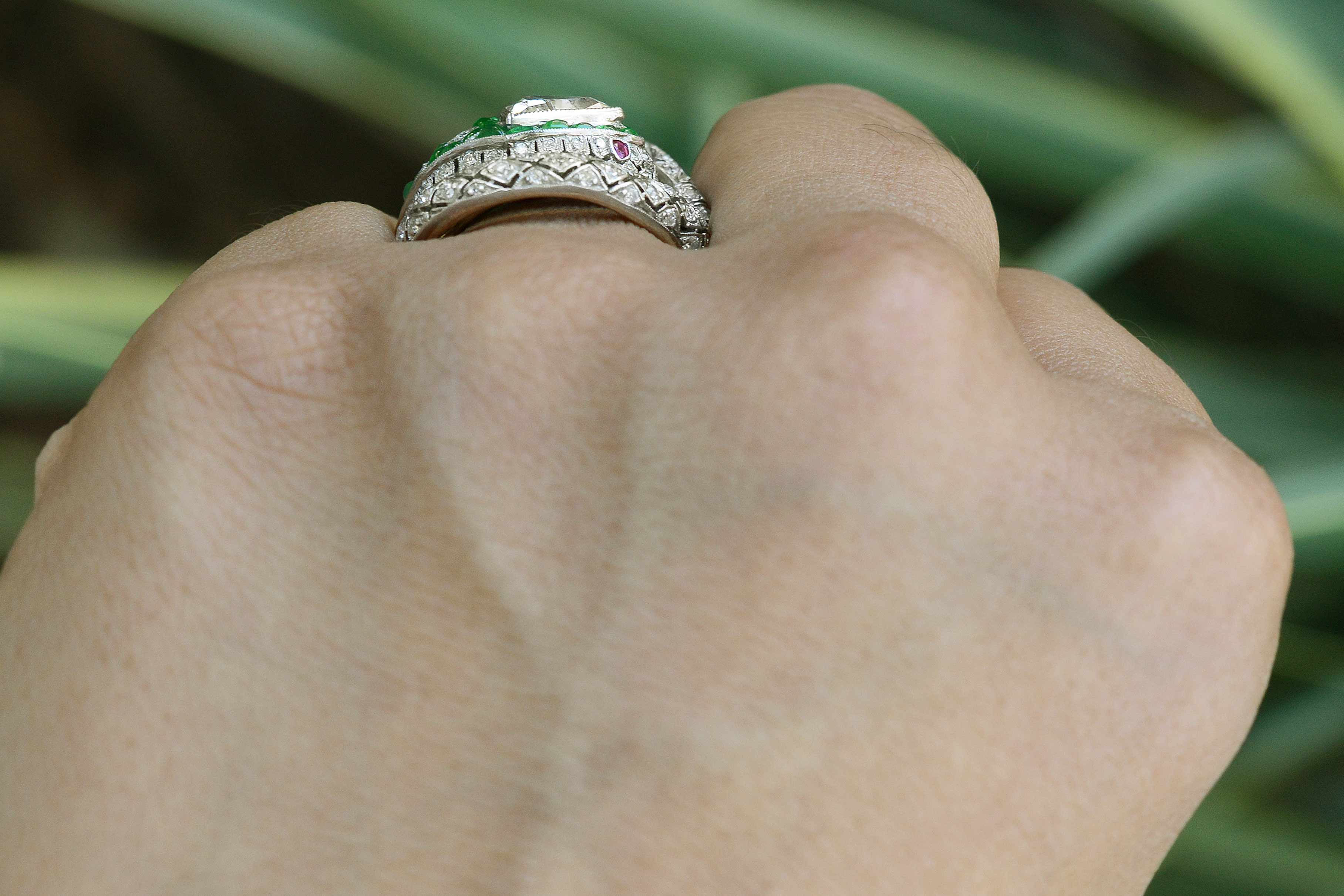 An Egyptian inspired diamond and emerald ring.