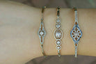 Here are some other antique diamond cluster tennis bracelets in stock.