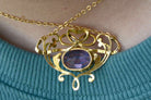 With scrolling, flowing vines, this is an authentic antique Art Nouveau amethyst necklace.