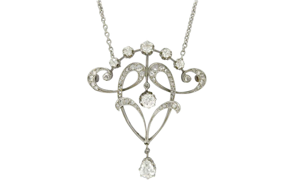 An Edwardian 1910 diamond filigree pendant necklace.