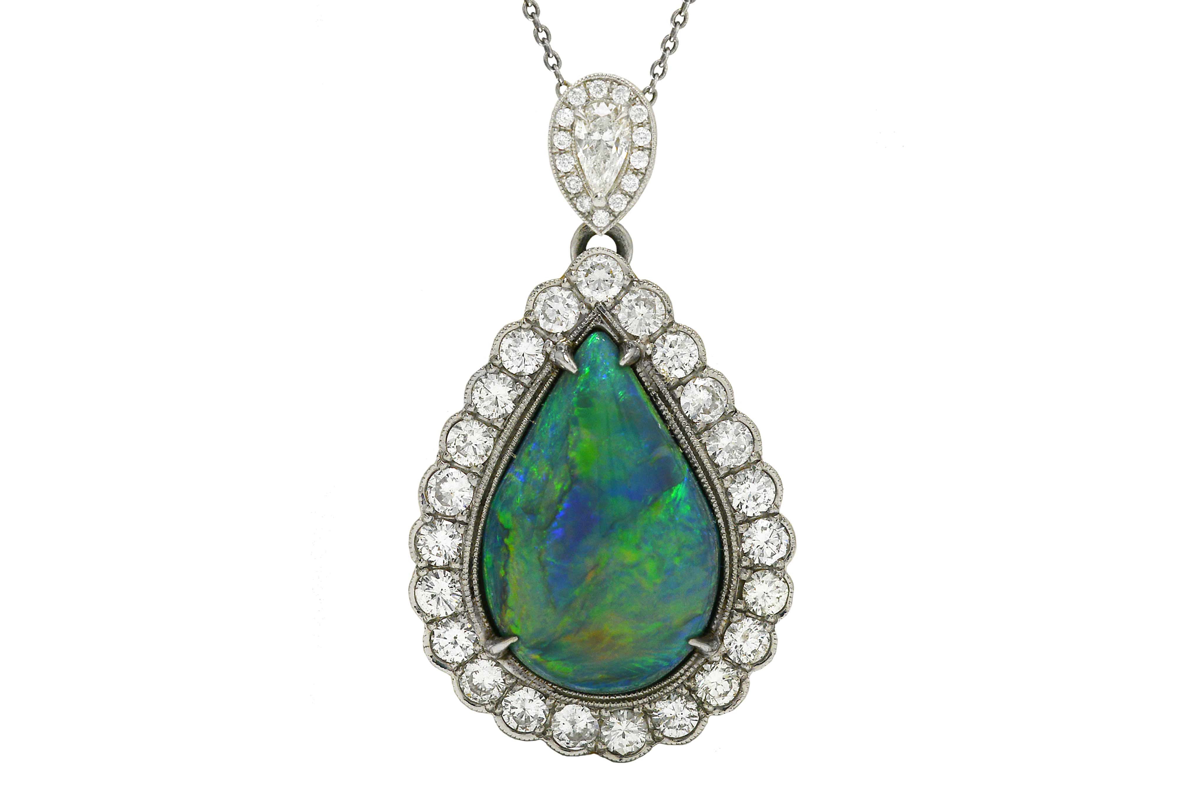 A cabochon cut black opal diamond halo pendant necklace