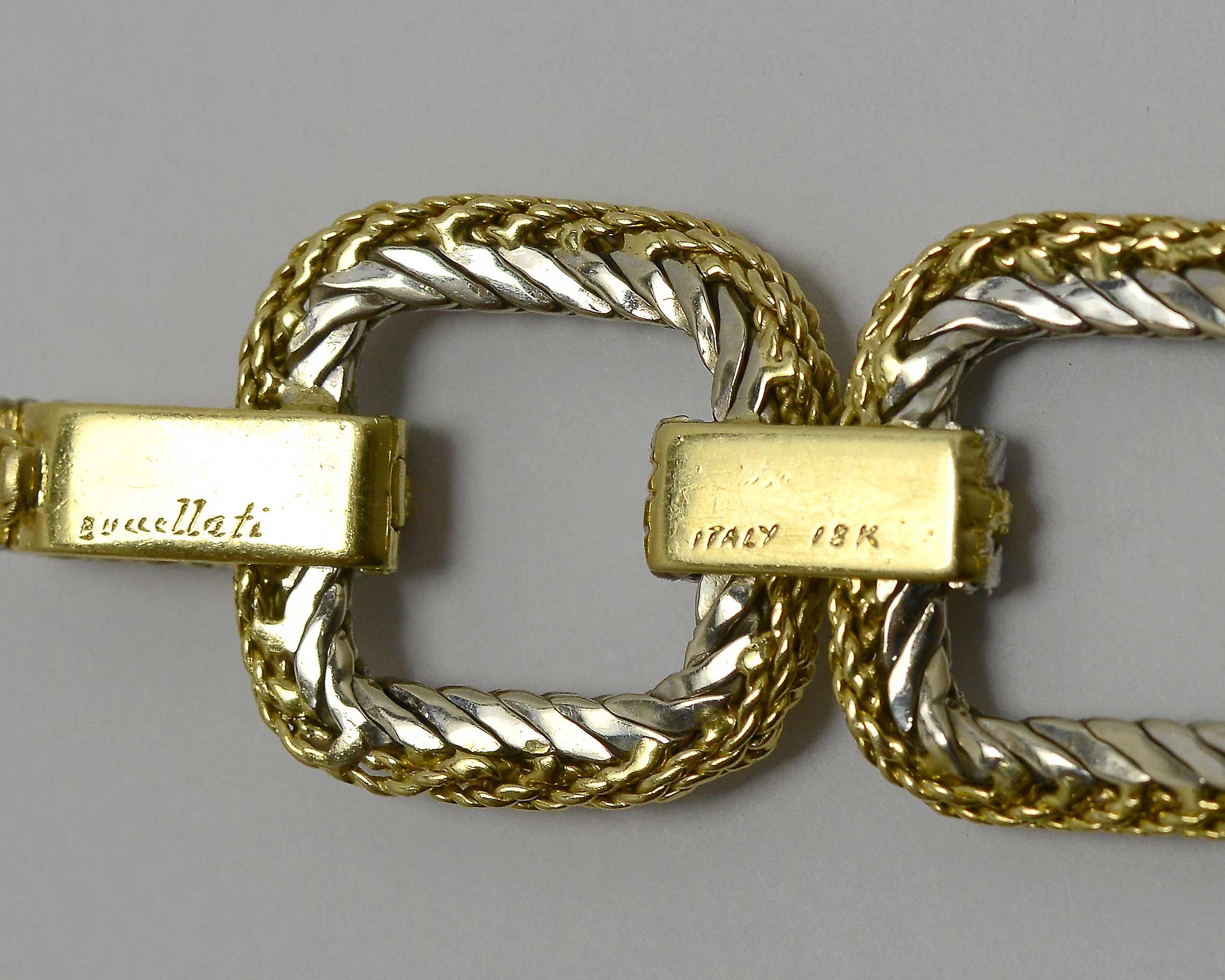 A buccellati Italy 18k hallmark engraved on a gold bracelet.