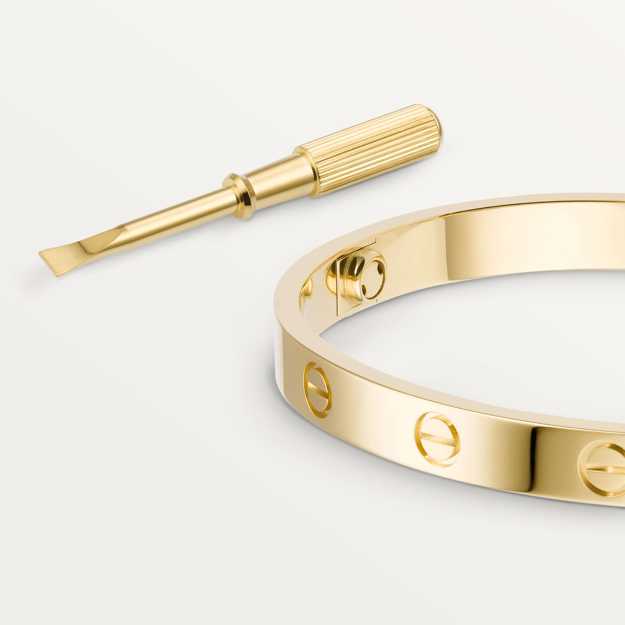 A modern design 18k gold bracelet by Cartier.