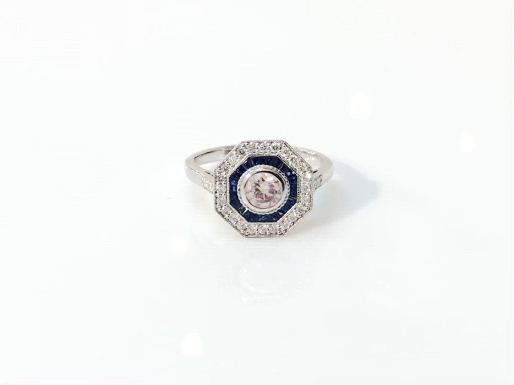Diamond blue sapphire octagon shape ring.