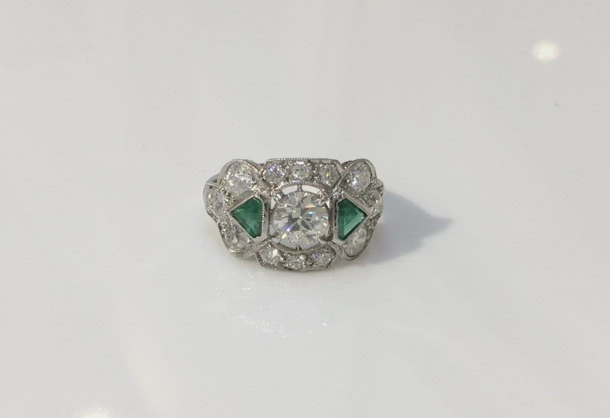 1920s Art Deco diamond emerald engagement ring.