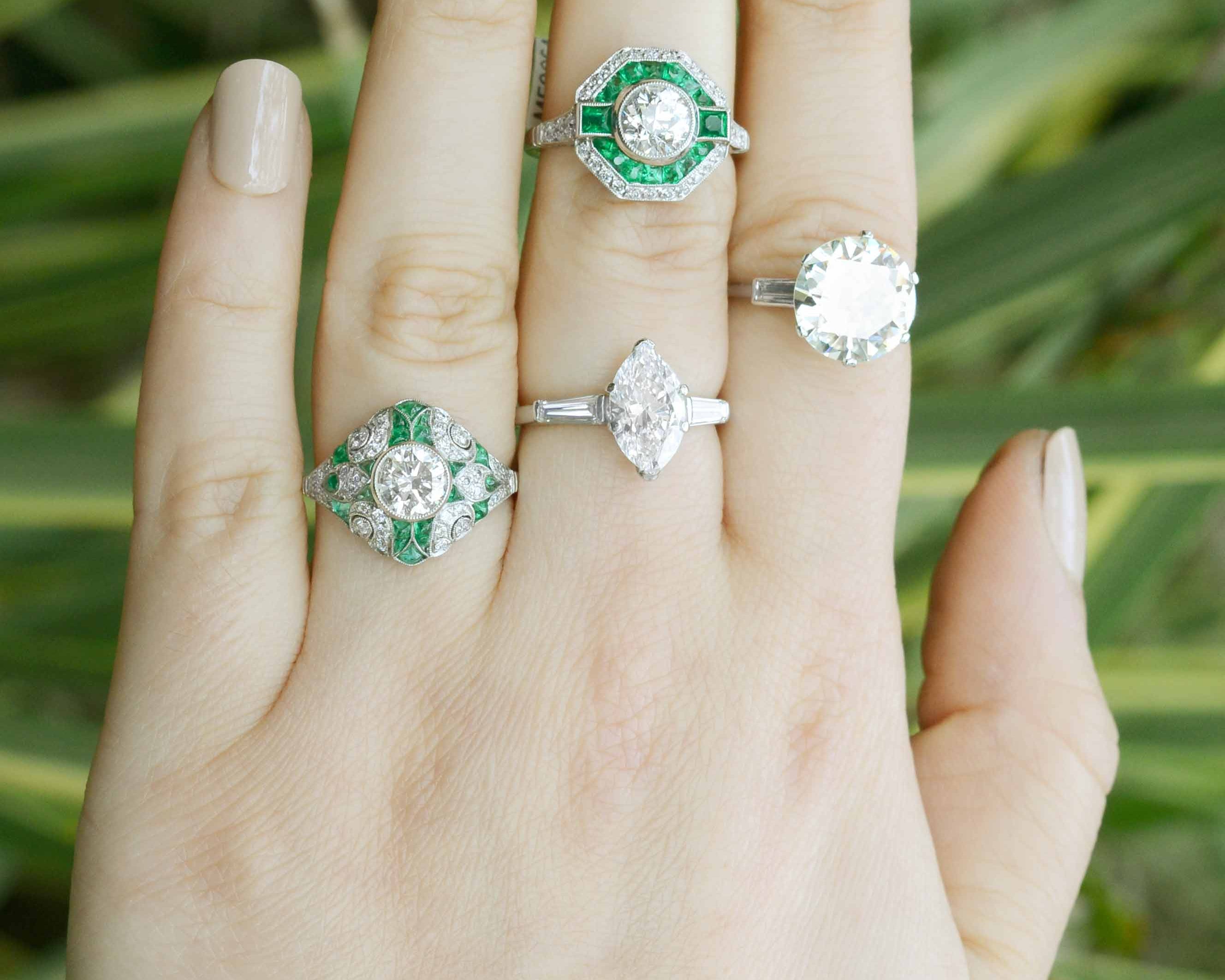 Diamonds and emeralds wedding rings.