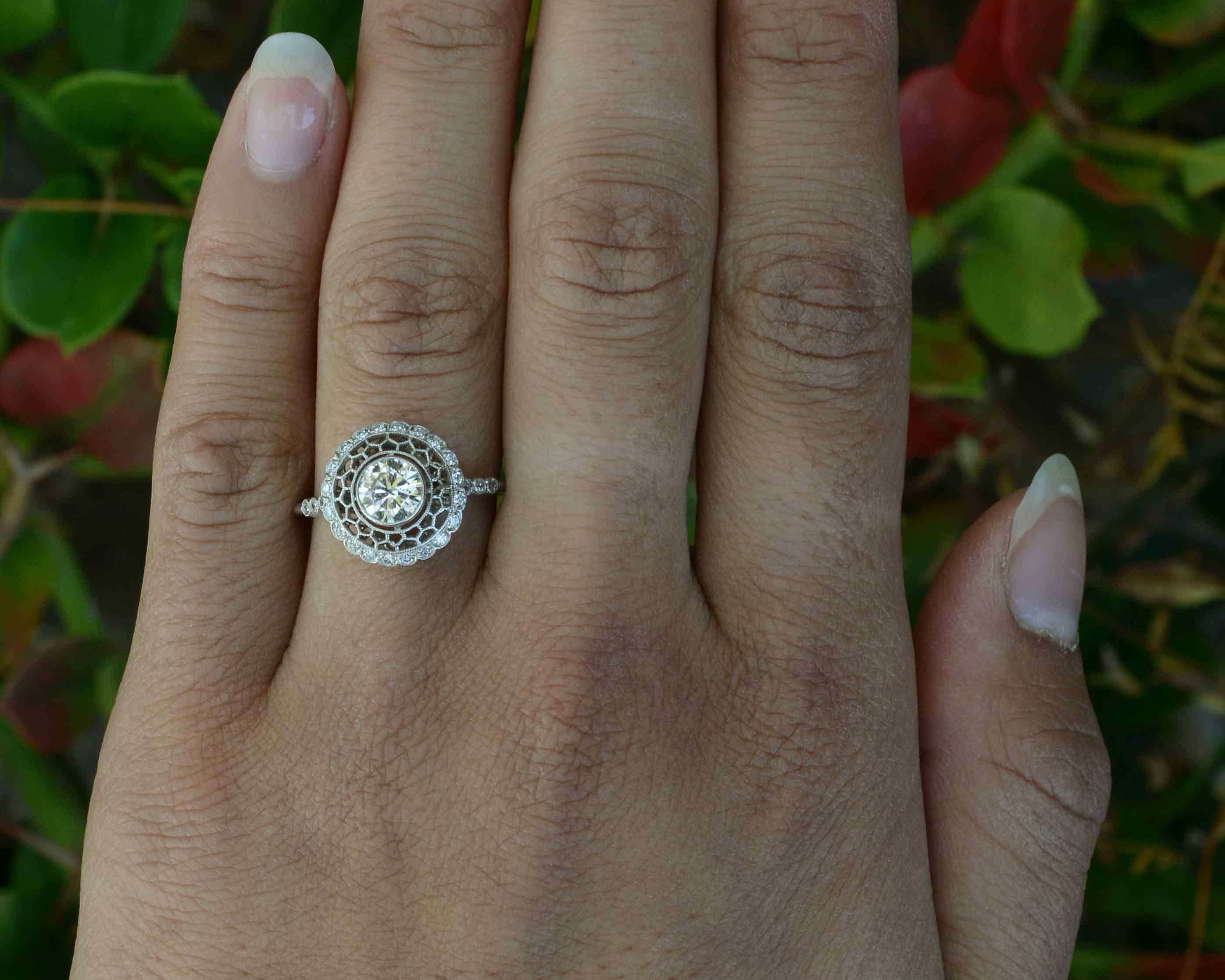 Snowflake diamond halo ring.