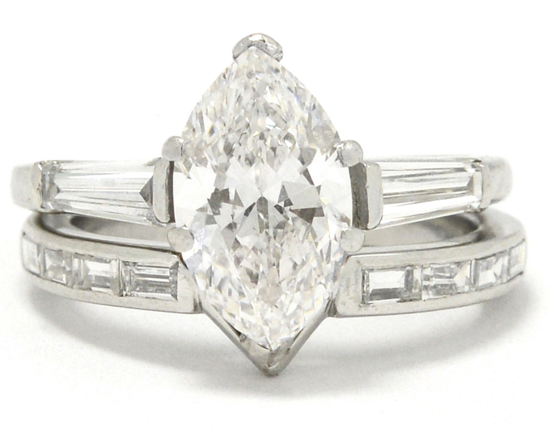 Here is the 2 carat marquise diamond engagement ring nestled in a custom band jacket.