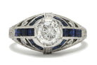 A unique diamond engagement ring with blue sapphire stripes.