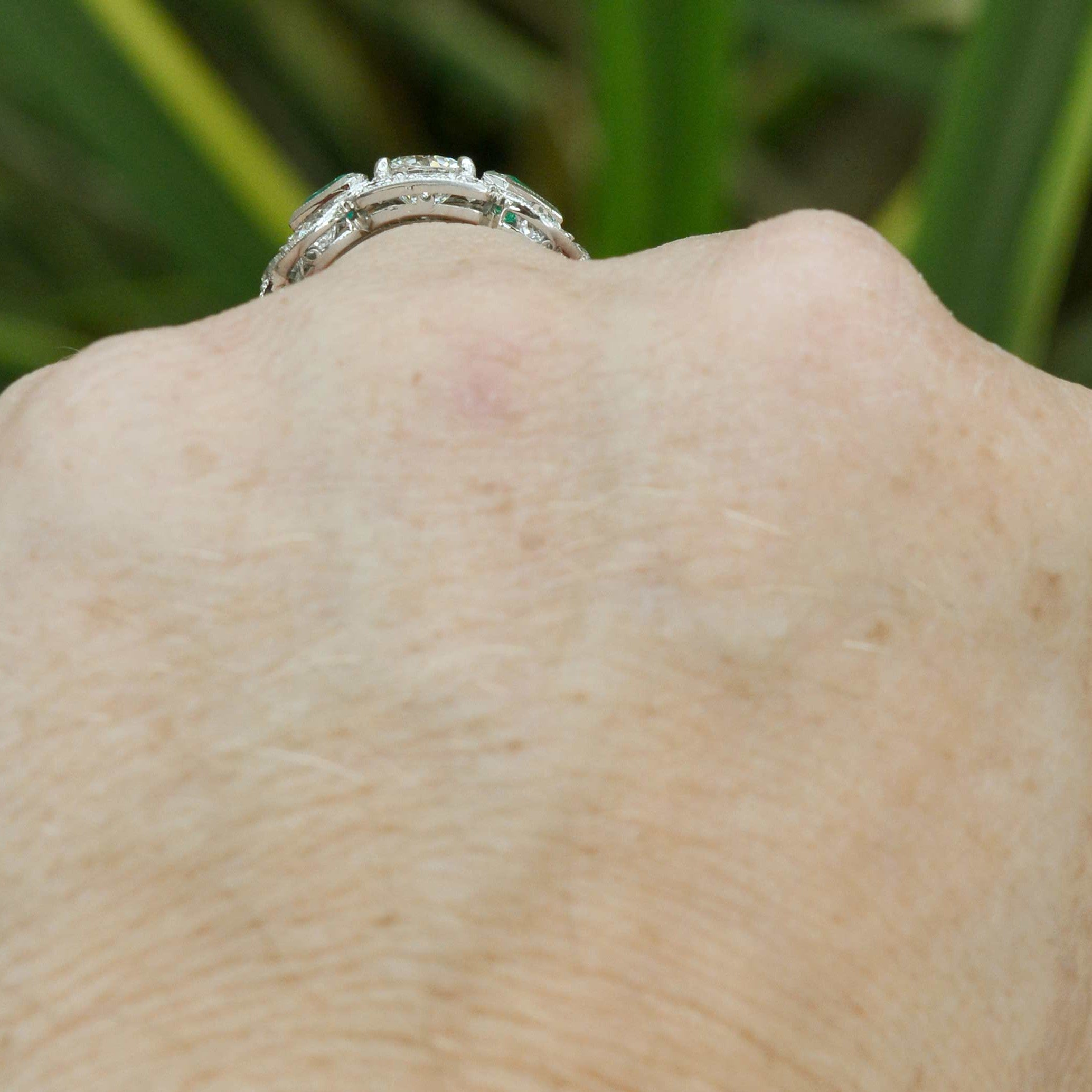 This diamond ring has low rise off the hand.