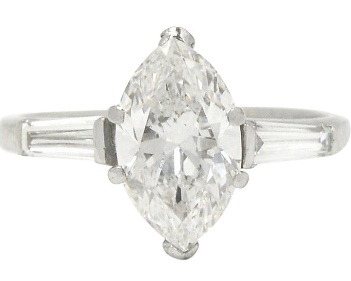 An over 2 carat marquise cut center diamond, antique engagement ring.