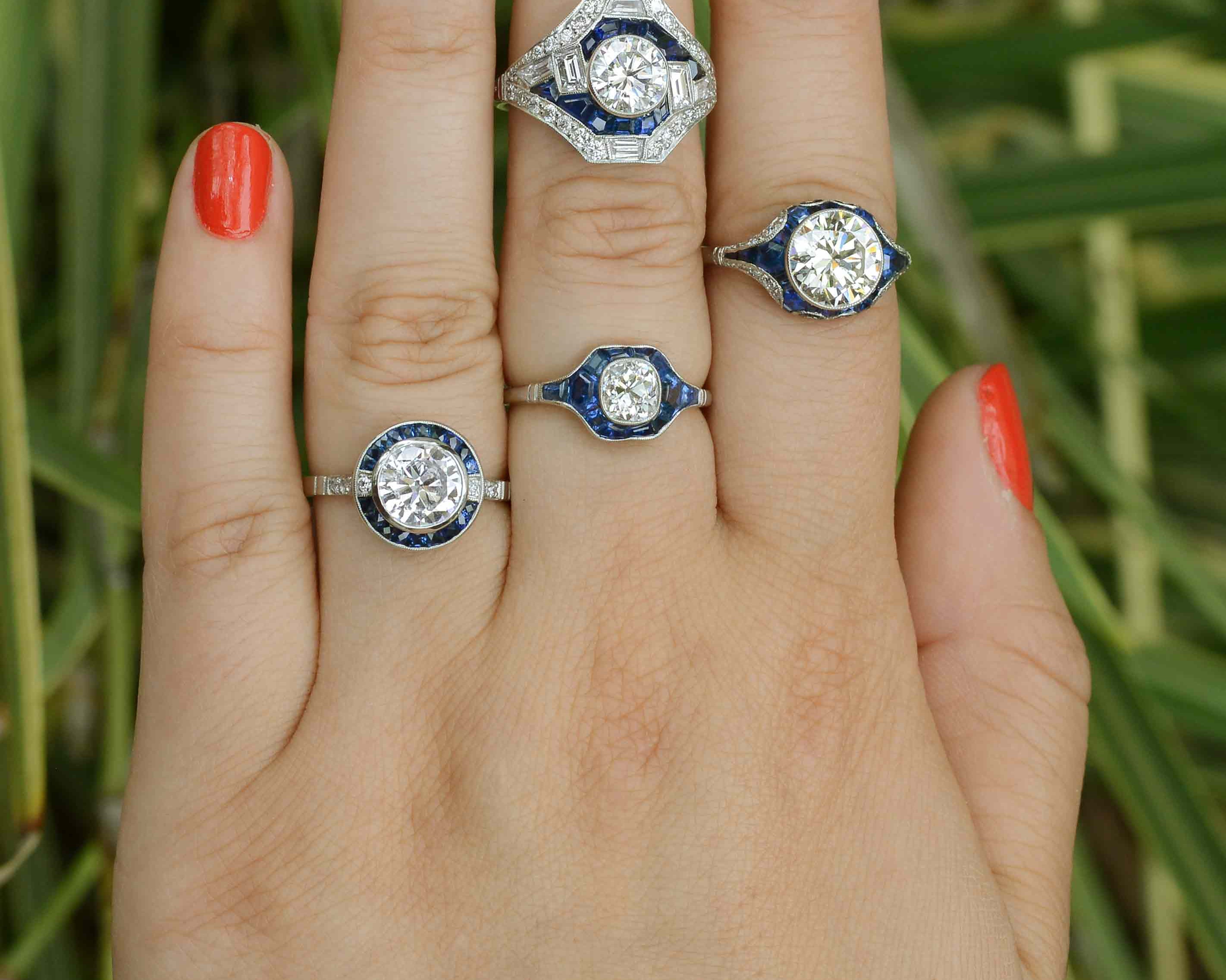A collection of blue sapphire & diamond bridal rings crafted of durable platinum.
