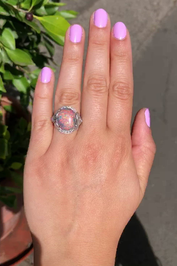 A dramatic black opal dome platinum cocktail ring from the Art Deco era.