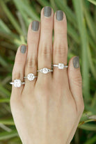 Round diamond platinum solitaire engagement rings.