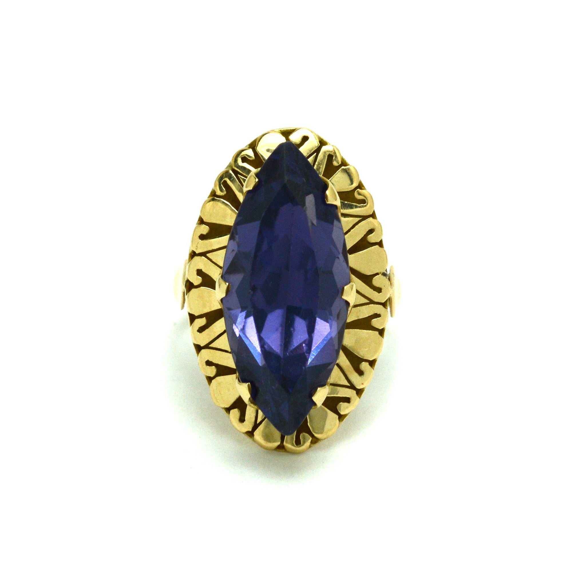 A marquise cut amethyst in a retro 14k gold ring setting.