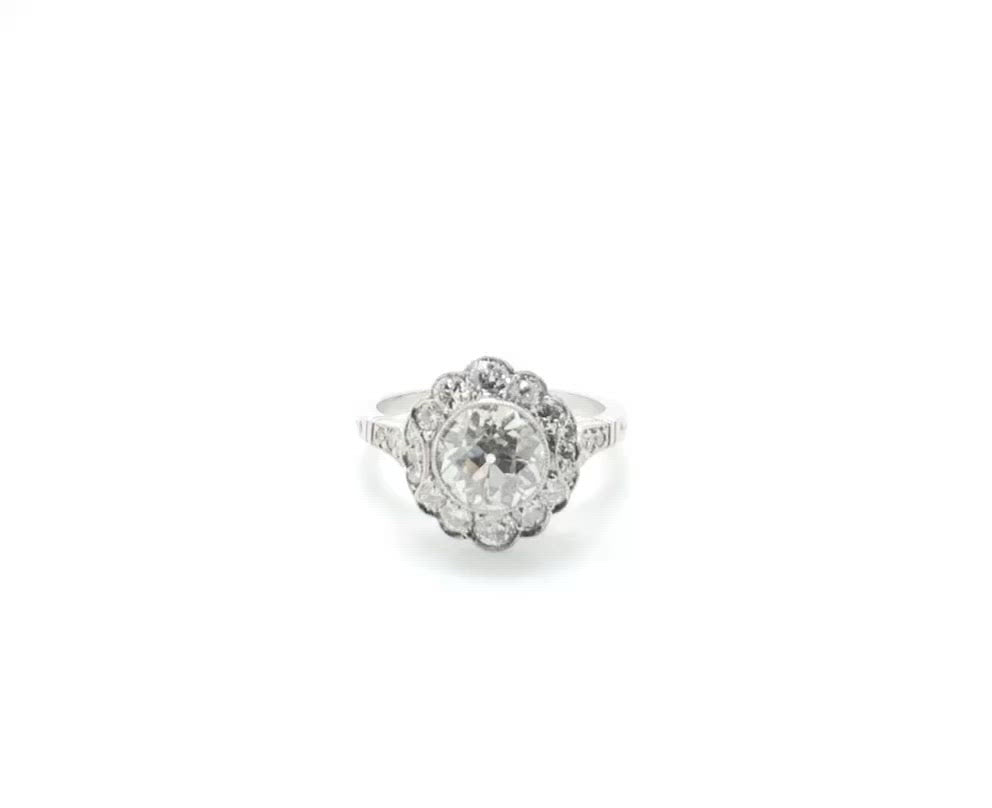 Over 1 carat old European diamond cluster wedding ring.