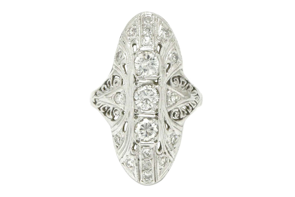 A navette shape ring with diamonds.