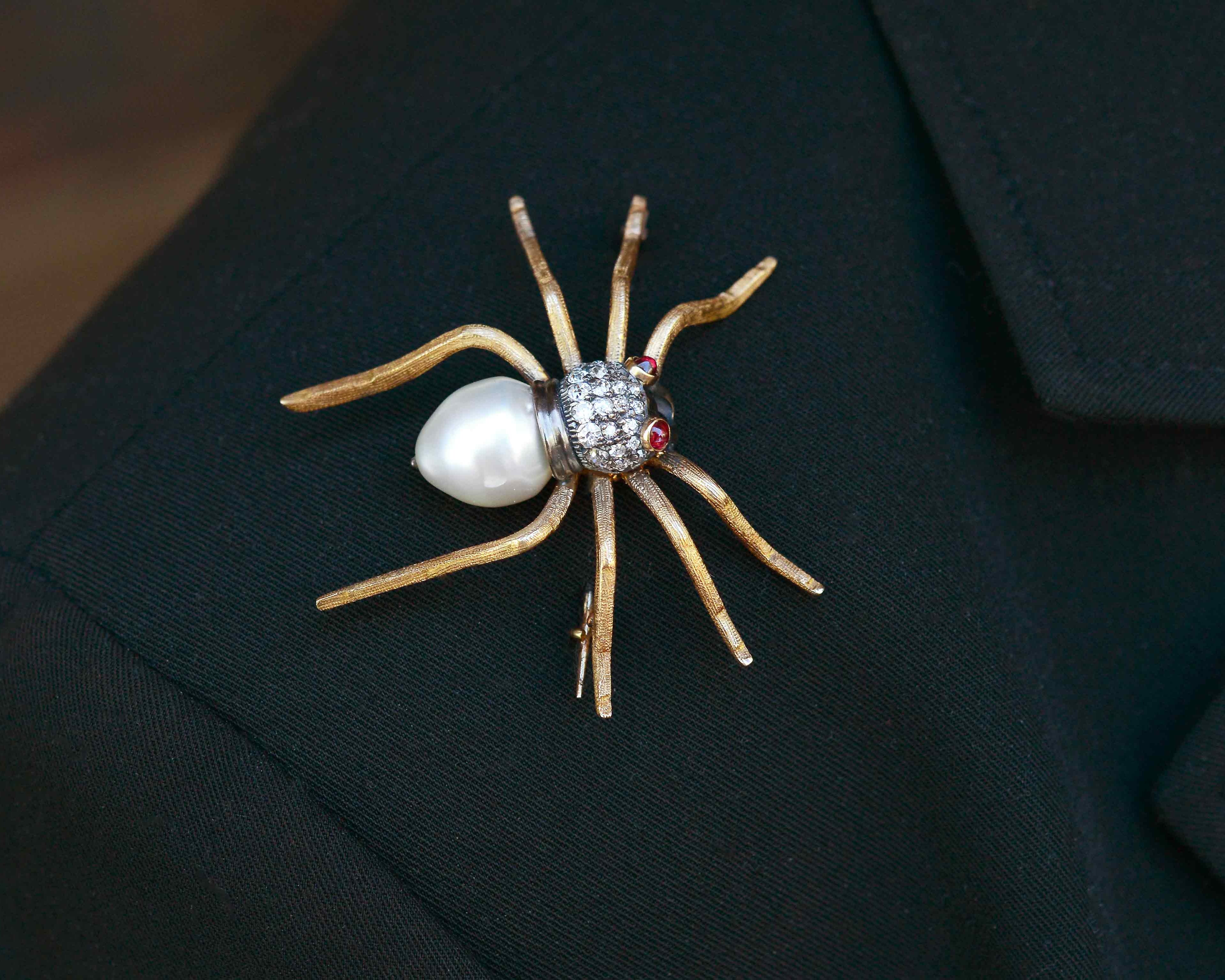 A giant diamonds and pearl tarantula pin.