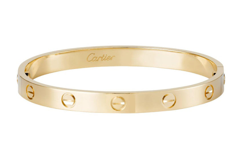 New, authentic size 16 gold love bracelet by Cartier.