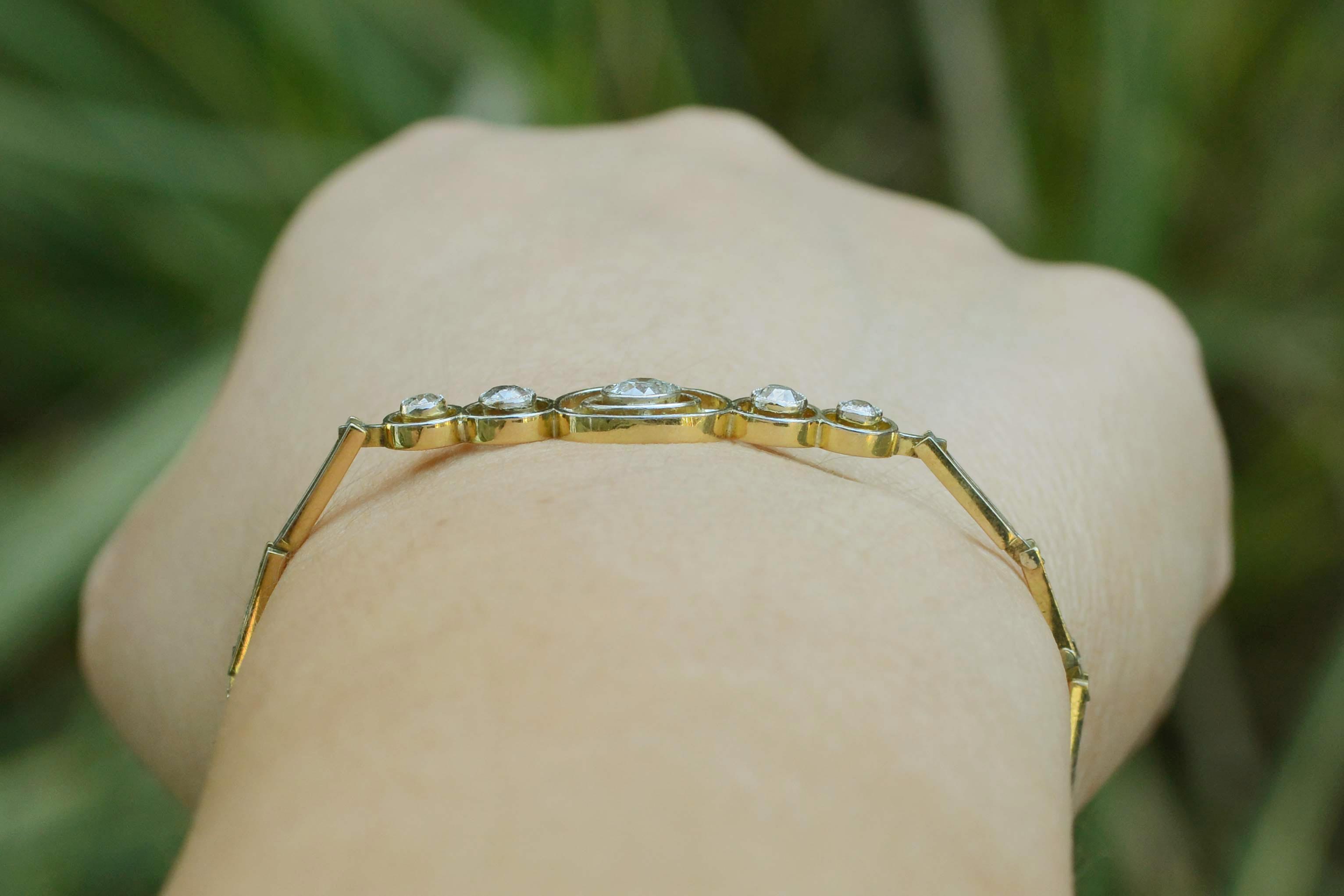 Over a half carat of old mine diamonds are in this 5 bezel setting bracelet.