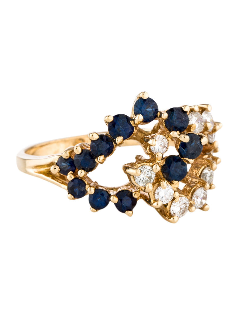 Round brilliant sapphires and diamonds loop ring.