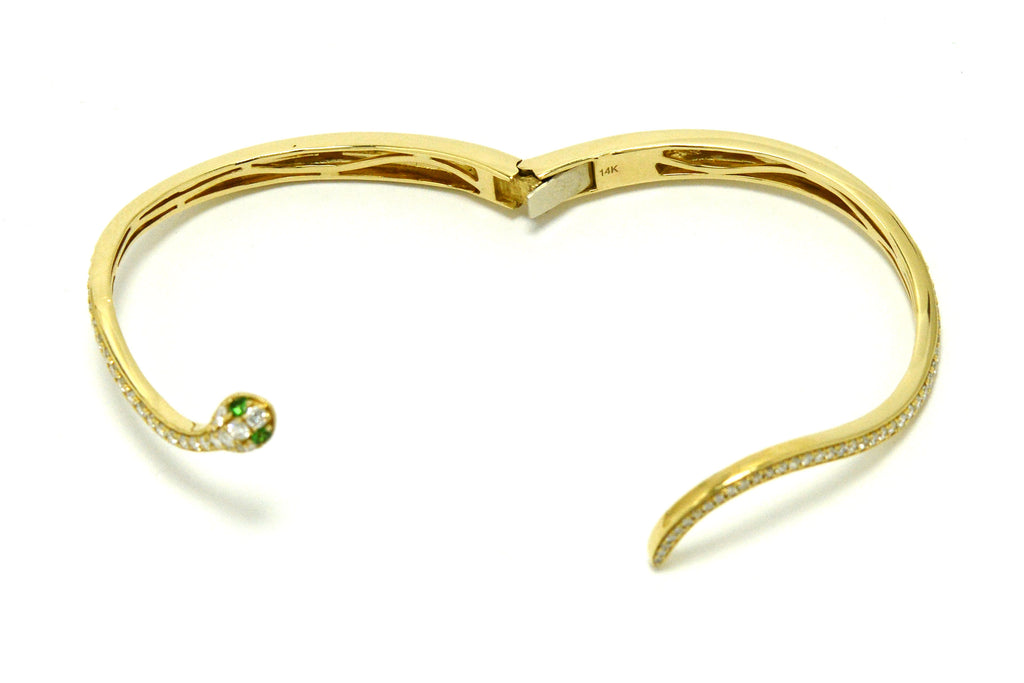 This gold snake bracelet has an engraved marking 14k.