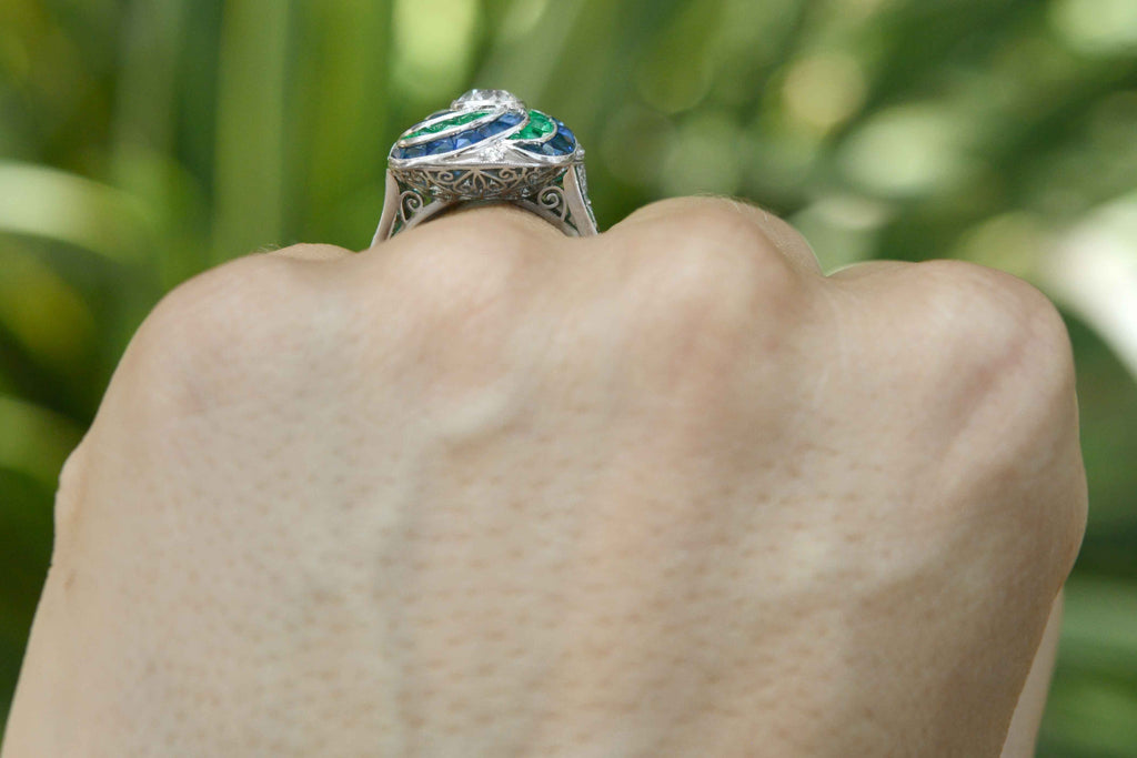 A unique one carat diamond platinum engagement ring with a filigree undergallery.