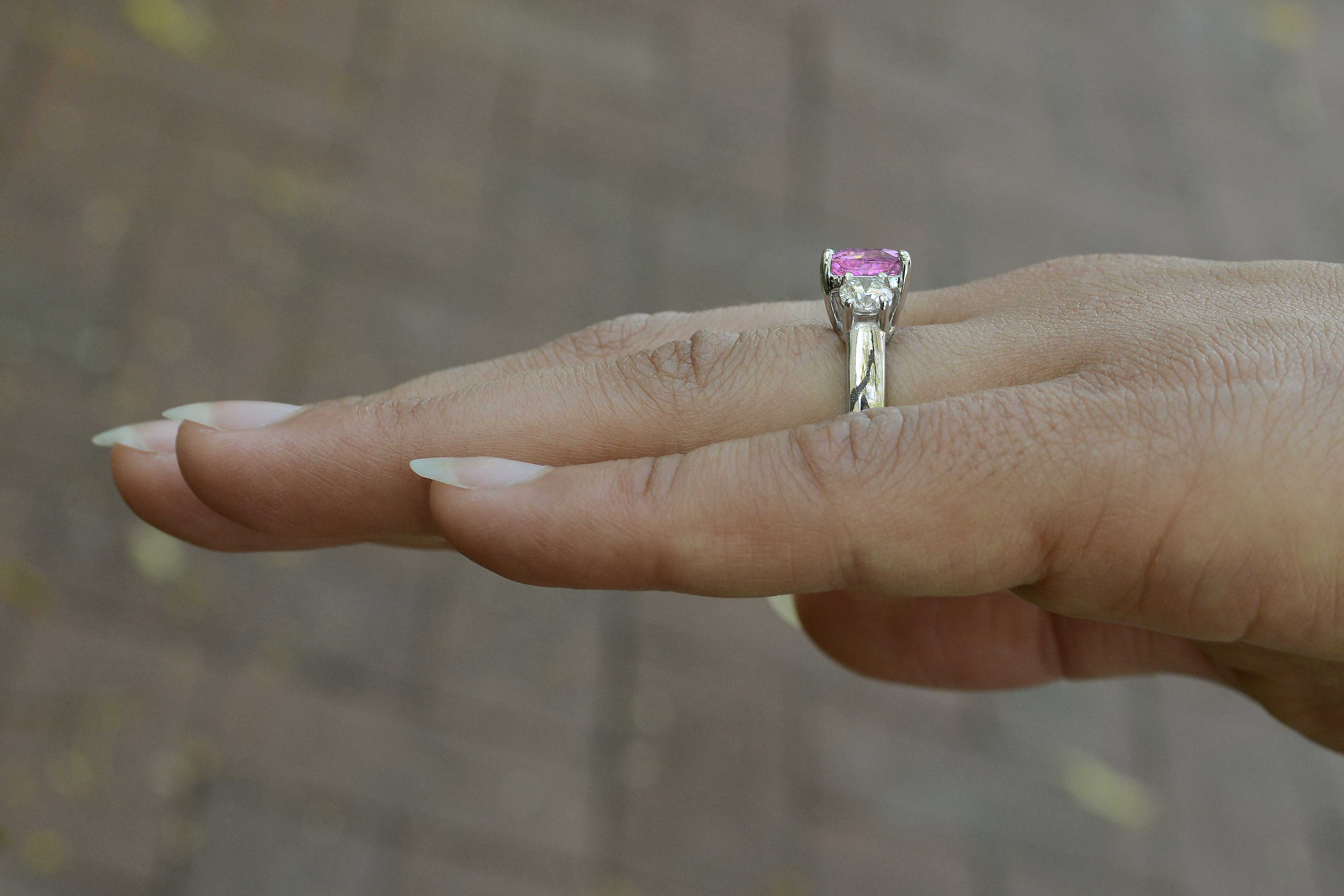 A neo classical revival pink sapphire engagement ring, the style is from the early 1900's.