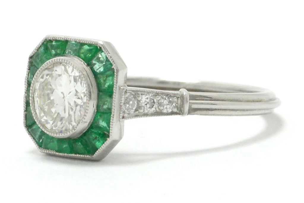 An octagon diamond emerald target Art Deco engagement ring.