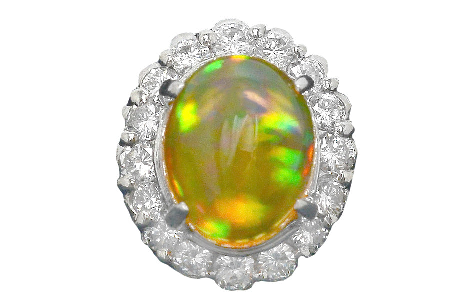 An oval cabochon cut opal dome ring.