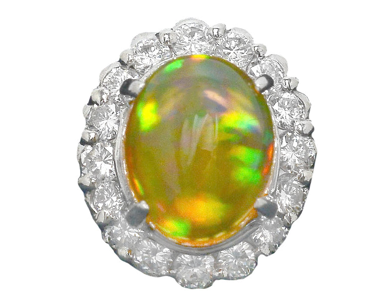 An oval cabochon cut opal dome ring.