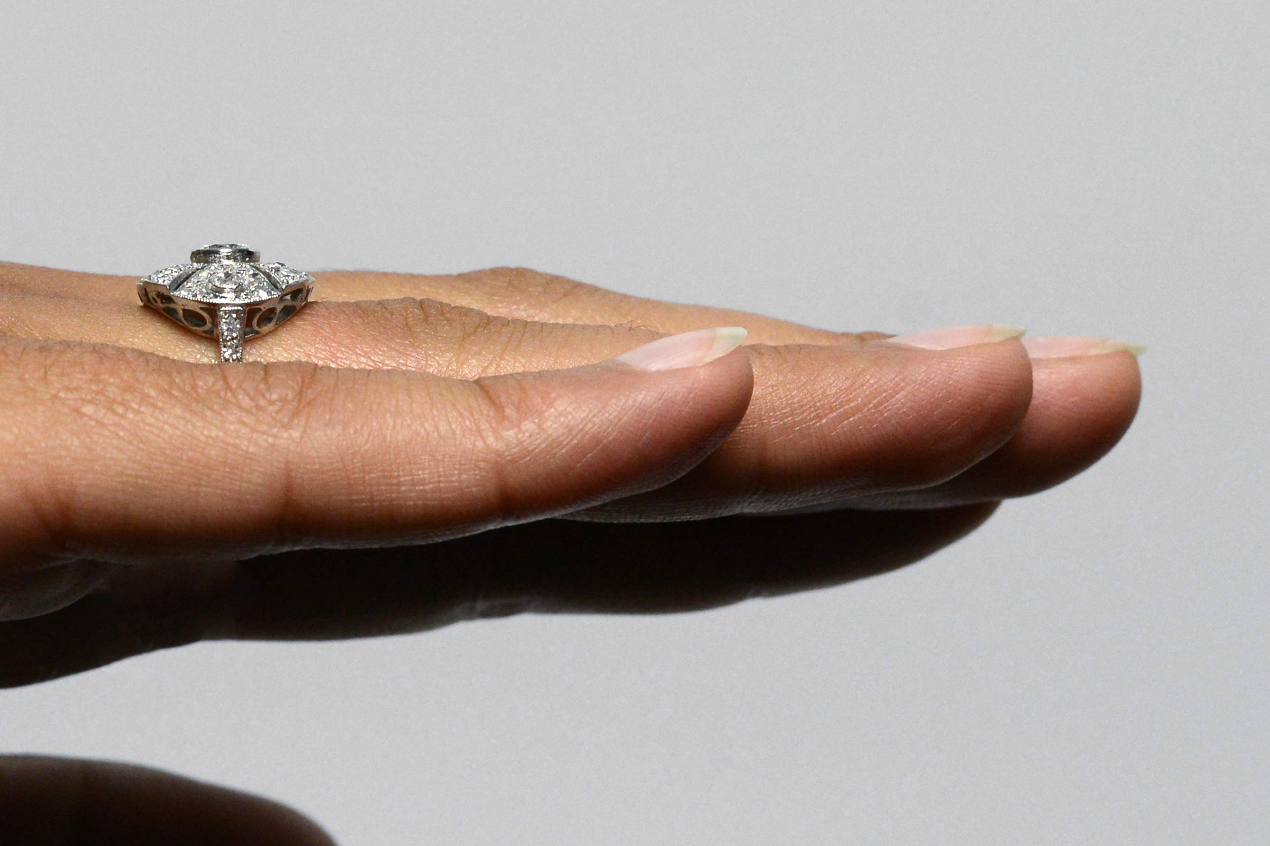A platinum band and palladium top diamonds statement ring.