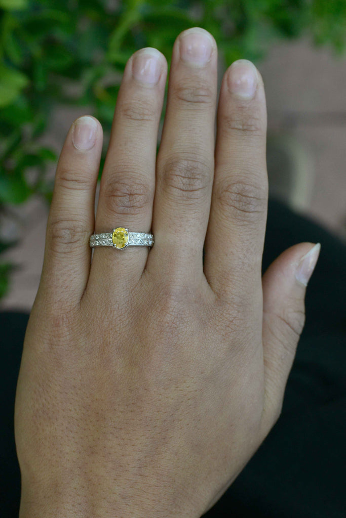 This diamonds band with a yellow sapphire could also be a stacking ring.
