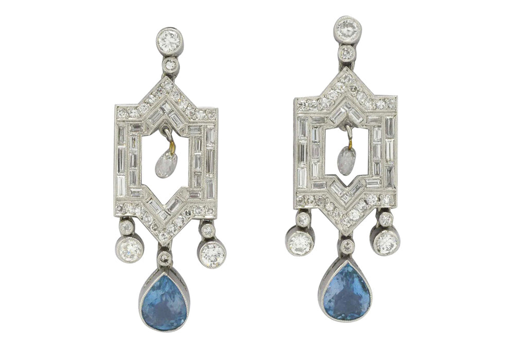 2 carats of glimmering round and baguette diamonds earrings.