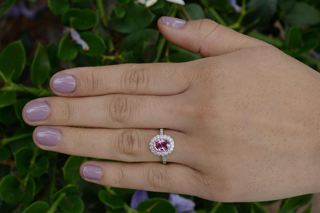 A natural pink 1.50 carat oval pink sapphire wedding ring.