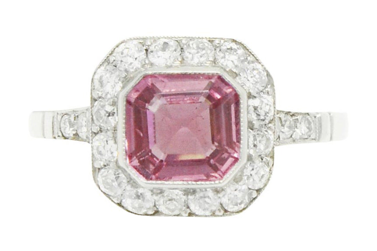 A square, natural pink sapphire in a diamond octagon engagement ring setting.