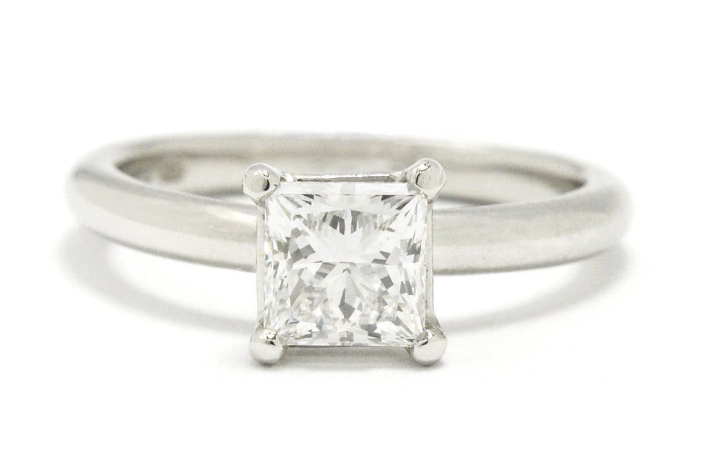 An f color with Vvs2 clarity princess cut diamond platinum solitaire ring.
