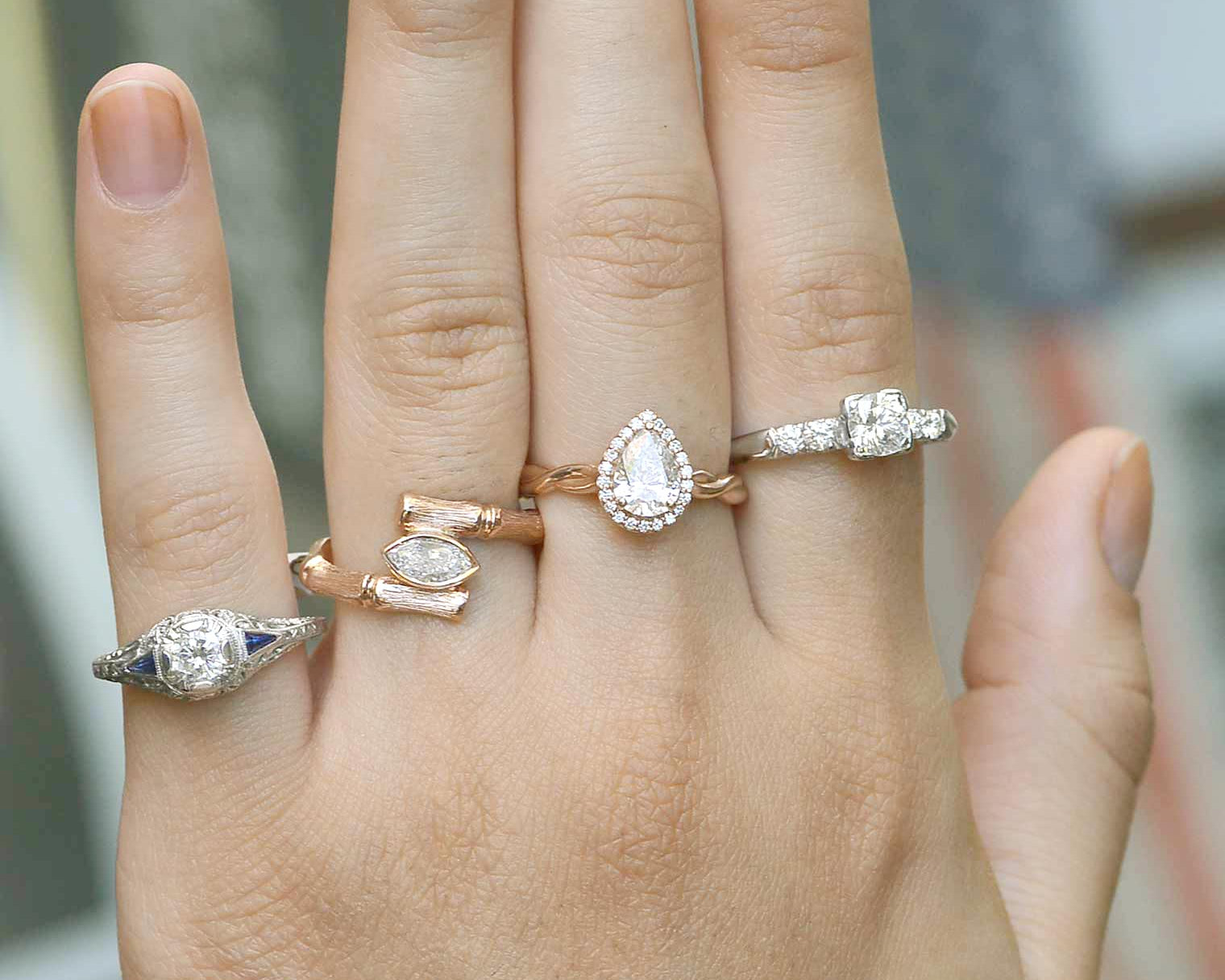 A variety of vintage and retro diamond rings crafted of platinum and rose gold.