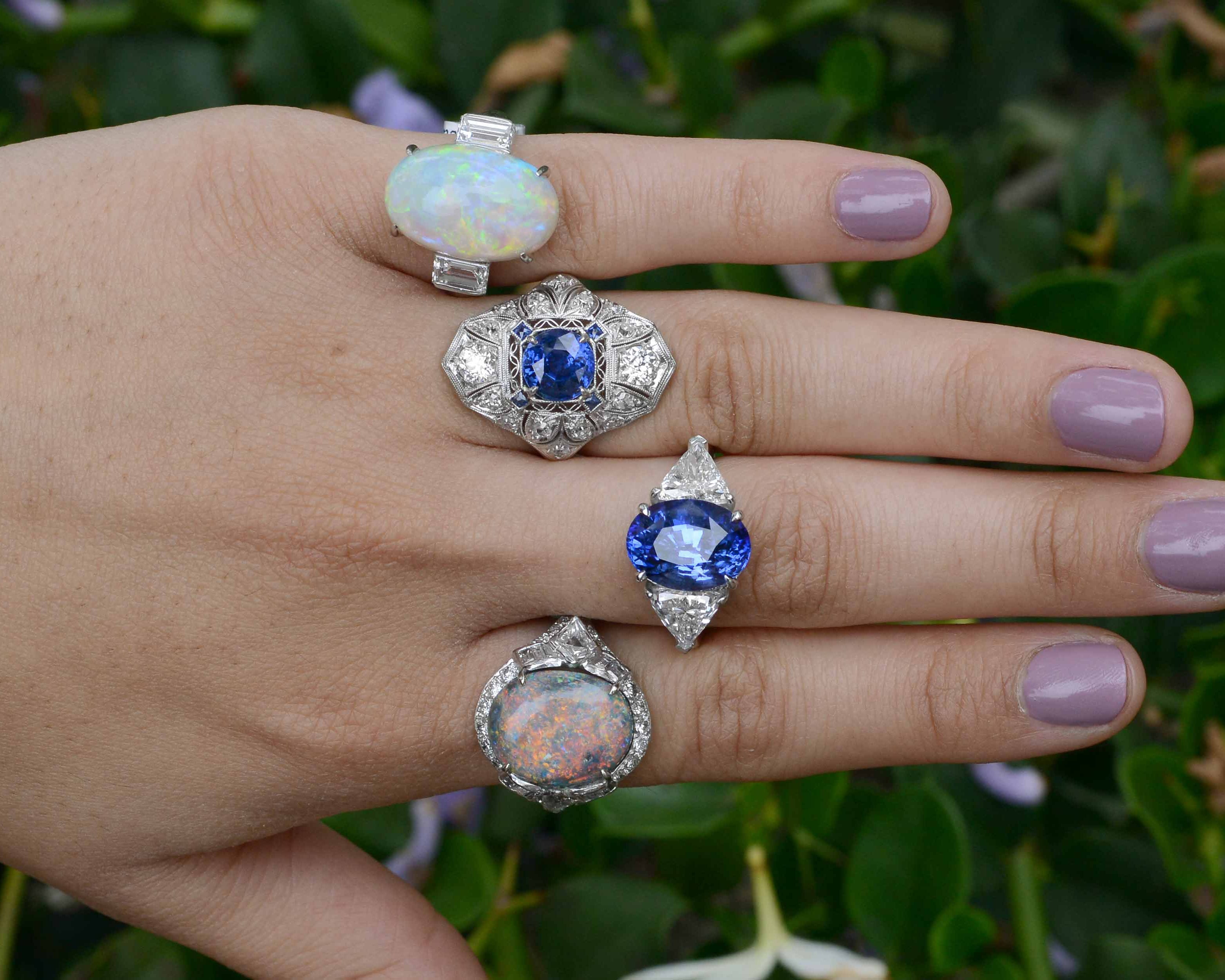 Big gemstone and diamonds cocktail rings.