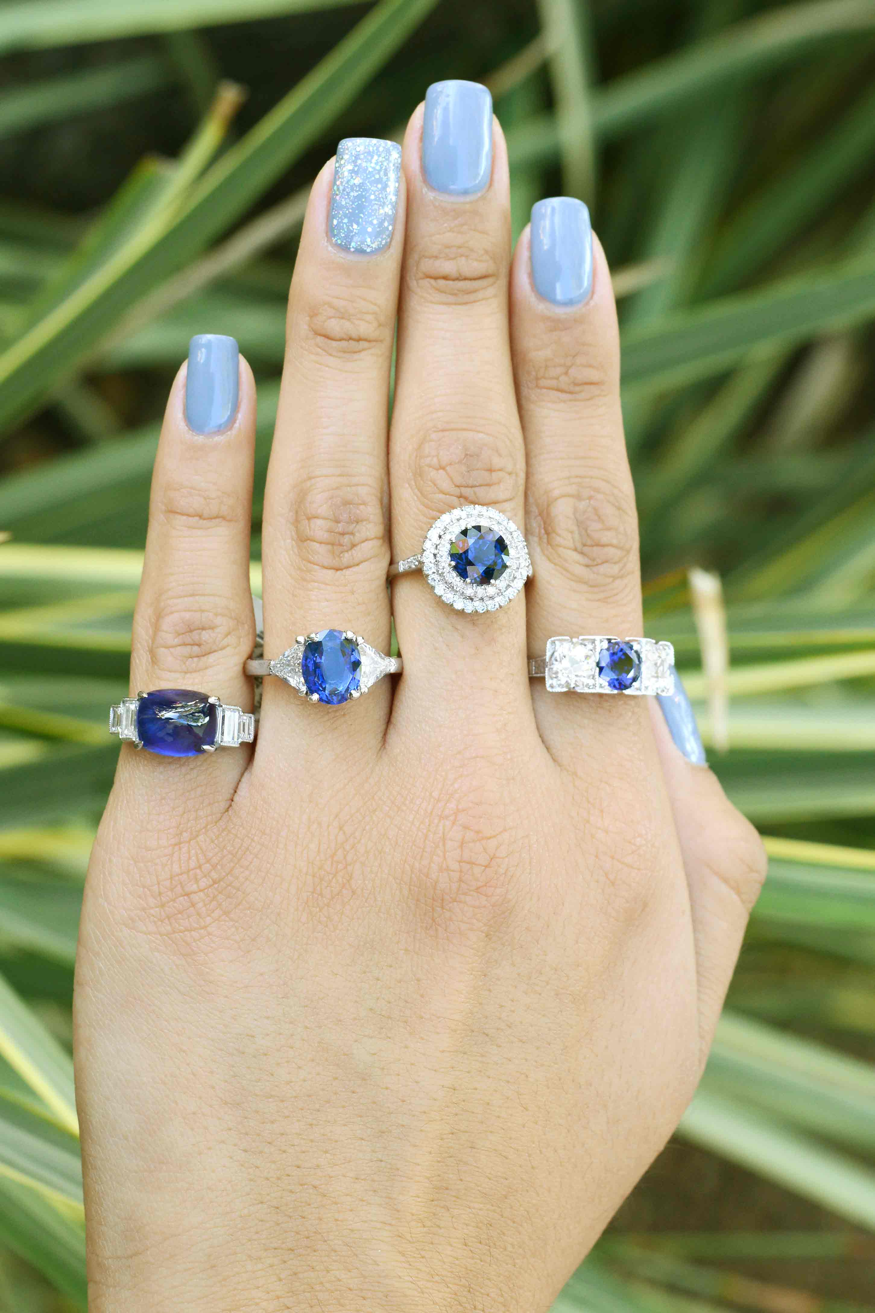 A peek at some of the diamond and blue sapphire engagement rings available from our shop.