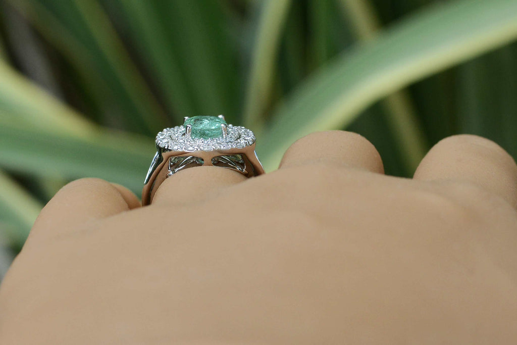 A new, original creation crafted of 14kt white gold and supported by a V style band.