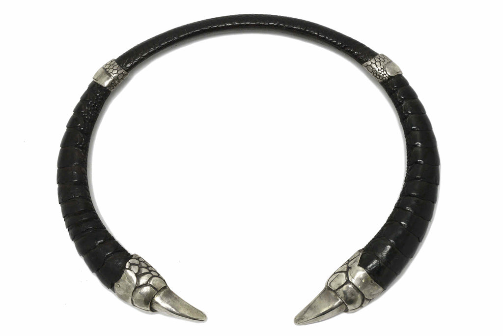 A new sterling silver claw statement necklace with black leather.