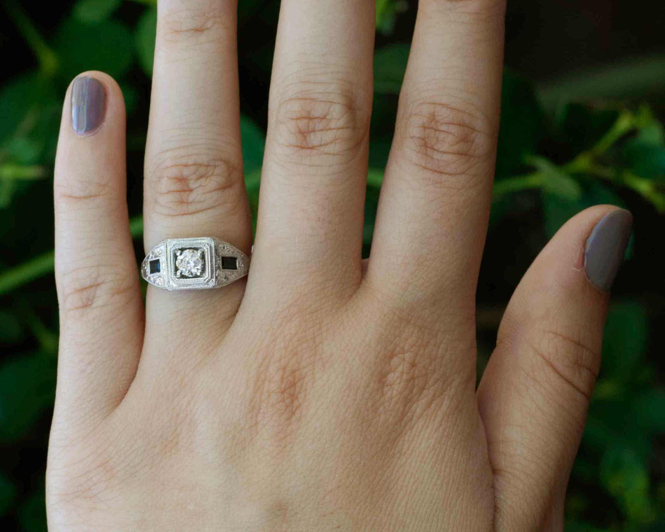 A unique three stone diamond sapphire wedding ring.