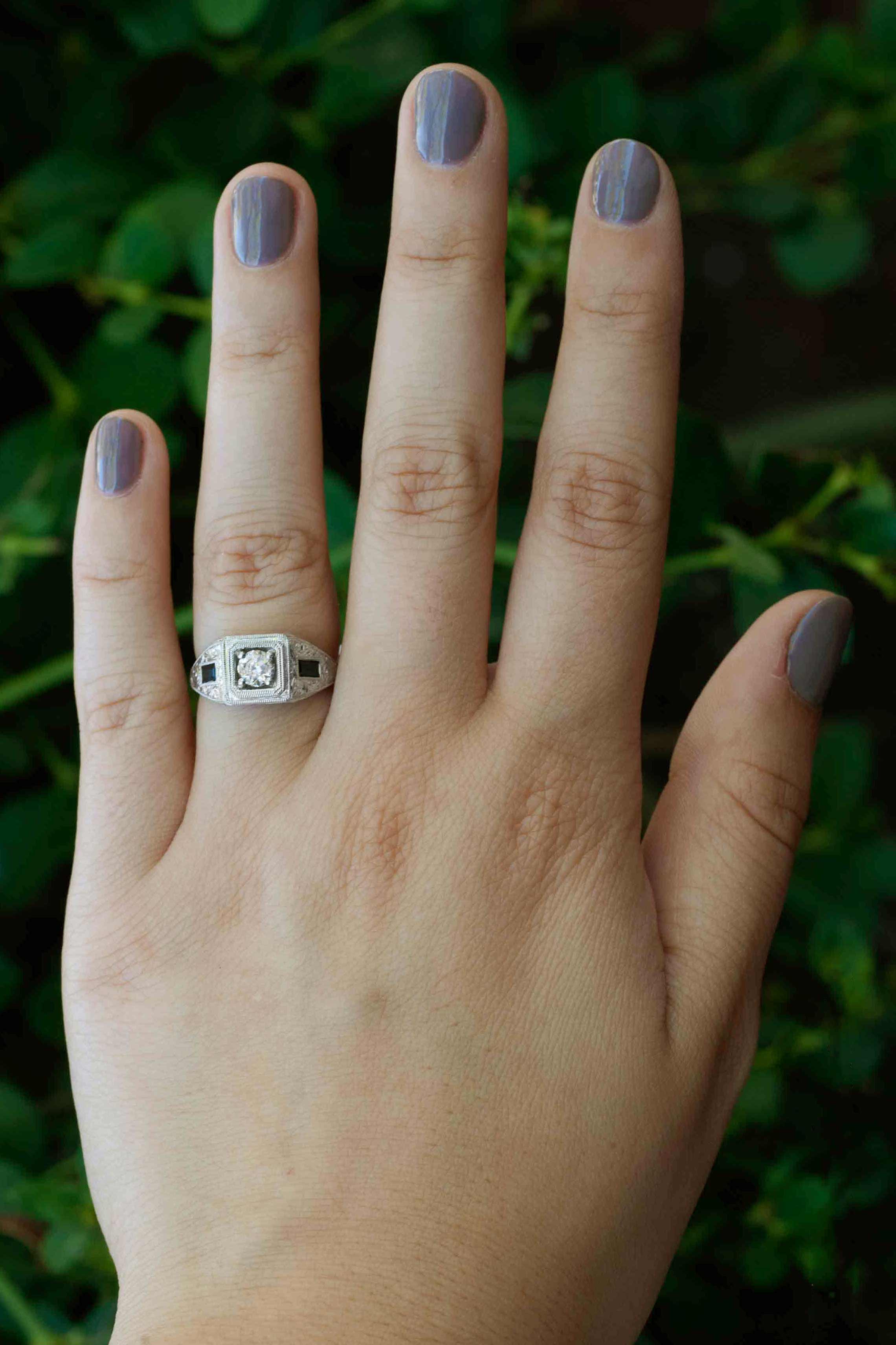 A unique three stone diamond sapphire wedding ring.