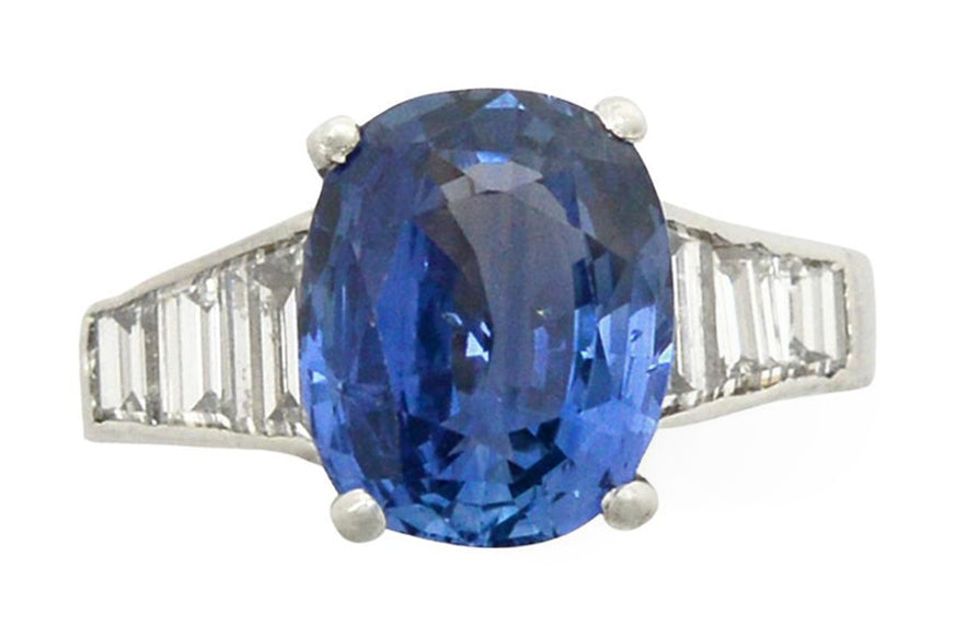 A no heat 5 carat oval blue sapphire engagement ring.