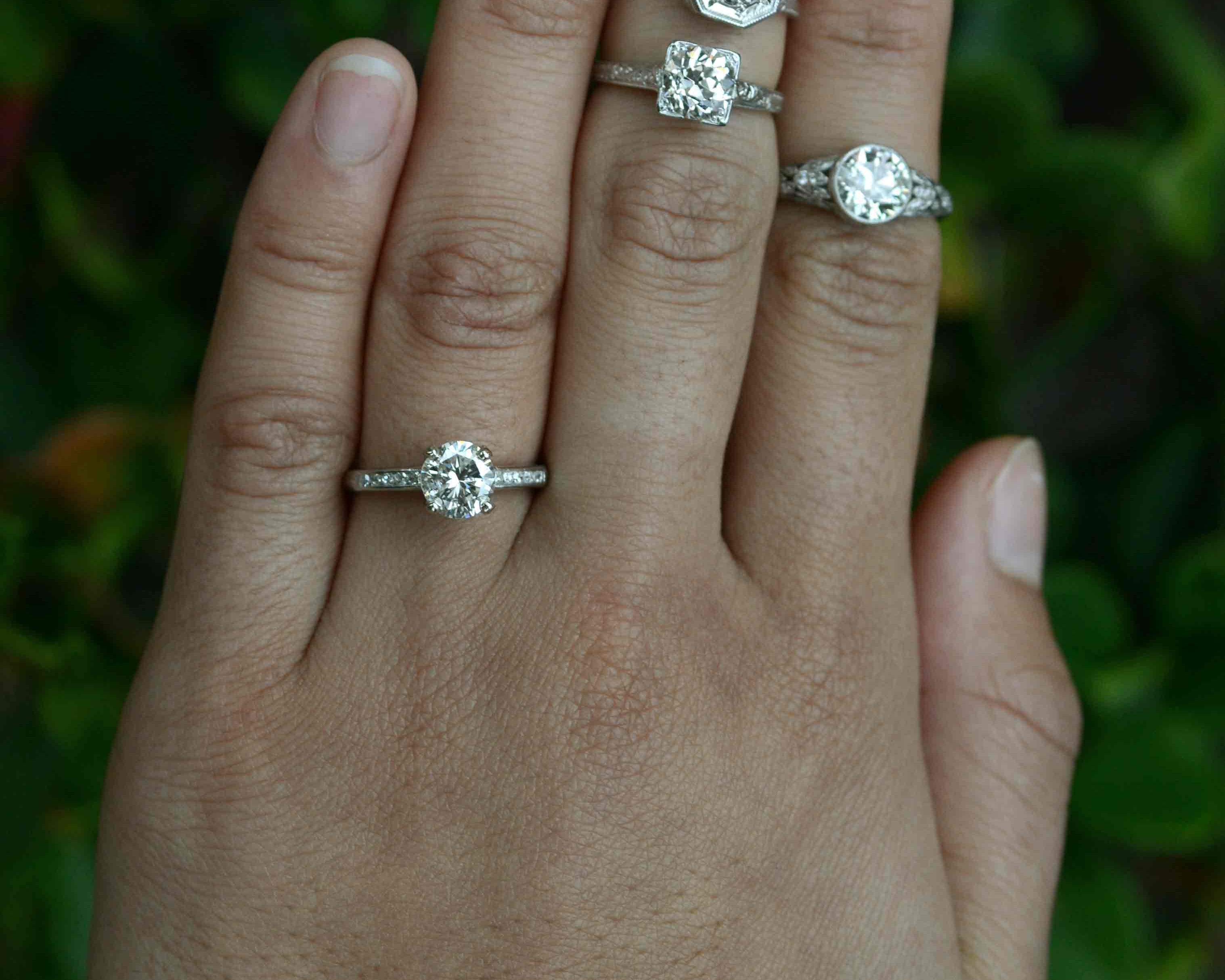 Vintage diamond platinum solitaire engagement rings.