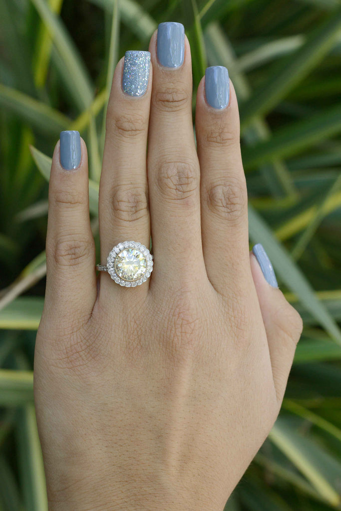 A huge diamond solitaire surrounded by a scalloped halo.